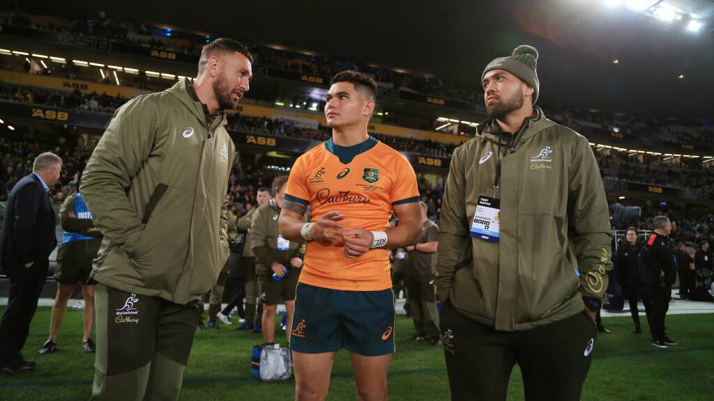 Quade Cooper (left) looms as the first choice flyhalf for the World Cup ahead of Noah Lolesio (centre). Picture Getty Images