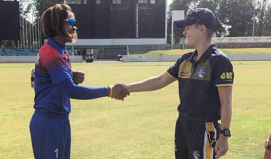 Thailand captain Sornnaron Tippoch & ACT XI captain Katie Mack shakes hands before the first game. Picture: Cricket ACT