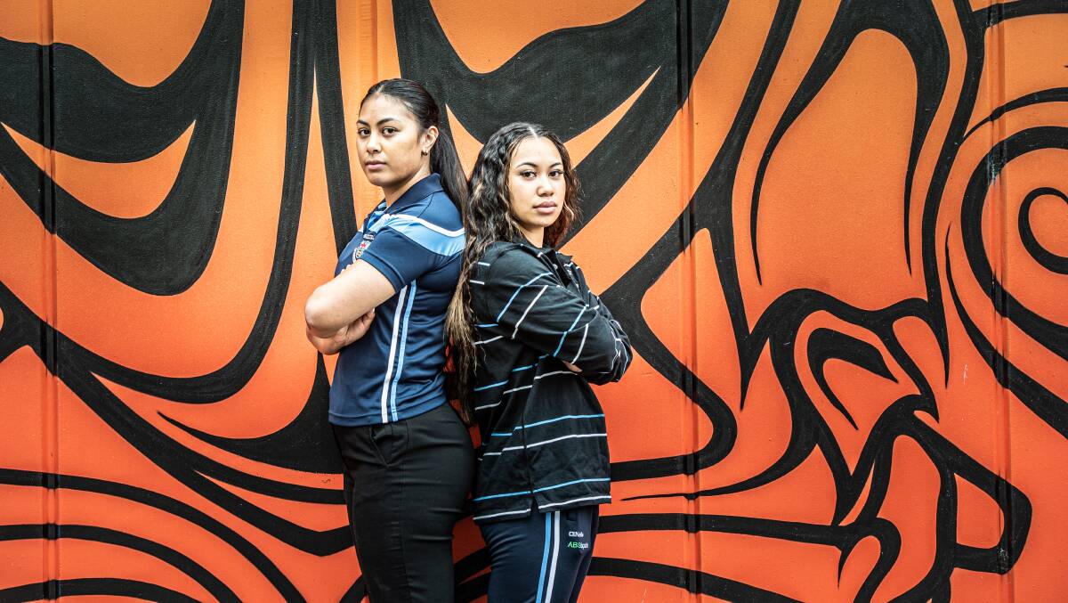 Caroline and Grace Tai both play rugby for the Queanbeyan Whites. Picture: Karleen Minney.