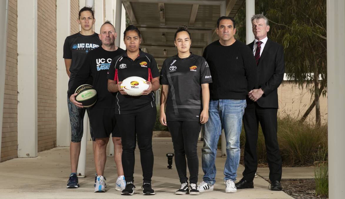 A united front: Gungahlin Eagles president Eoghan O'Byrne, coach Marco Caputo and players Jackie Lyras and Shaneqwa Lee-Edwards joined by Capitals duo Mariana Tolo and Paul Goriss to launch the campaign. Picture: Keegan Carroll
