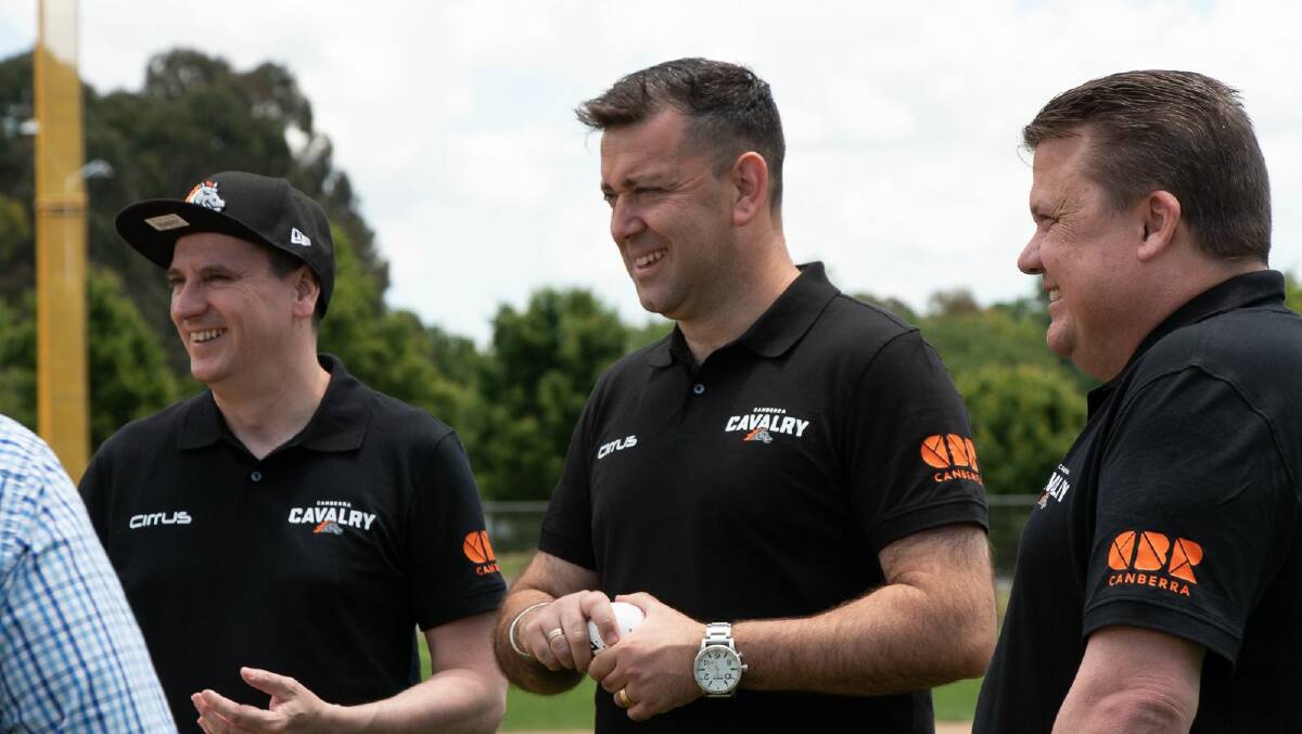 Cavalry chief executive Illya Mastoris (centre) and chief operating officer Brendon Major want to bring games to Canberra. Picture: Cavalry Media