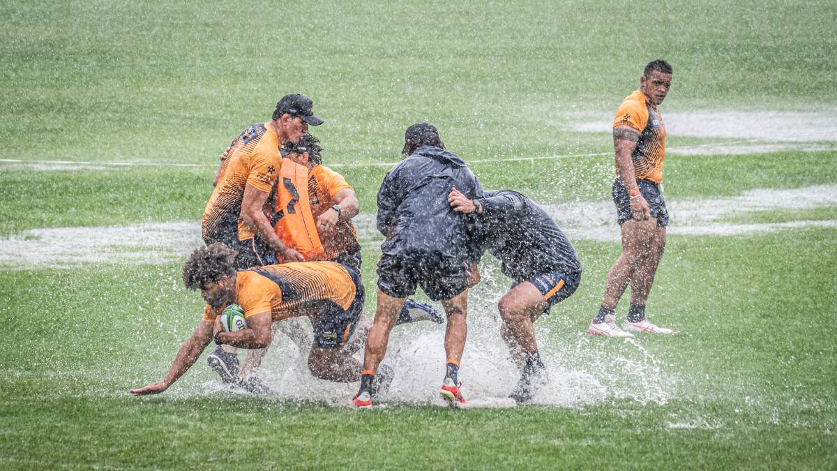 The Brumbies powered through torrential rain on Tuesday. Picture: Karleen Minney