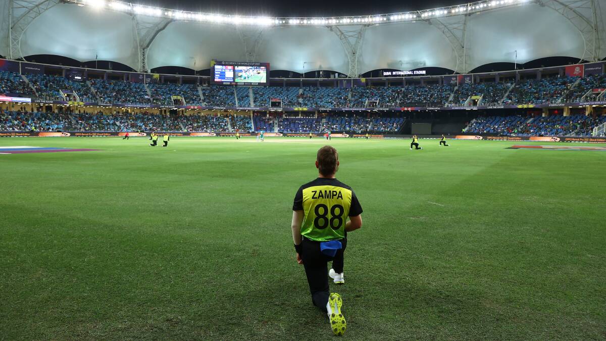 Adam Zampa and David Warner loom as two of Australia's biggest weapons in a showdown with New Zealand on Monday morning [AEDT]. Pictures: Getty