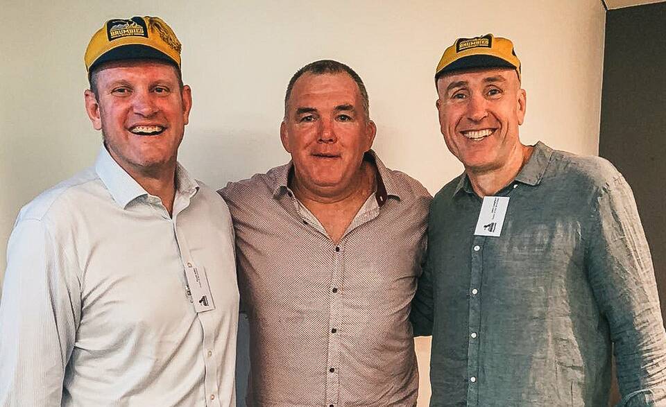 Owen Finegan presented David Giffin and John Langford with their caps. Picture: Brumbies Media