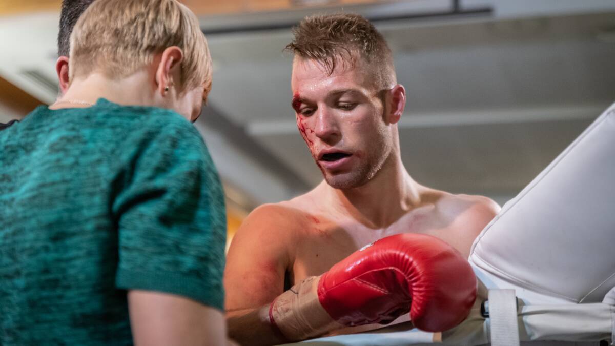 A cut wasn't going to stop Alex Cooper in his bout. Picture: Dimitri Yianoulakis