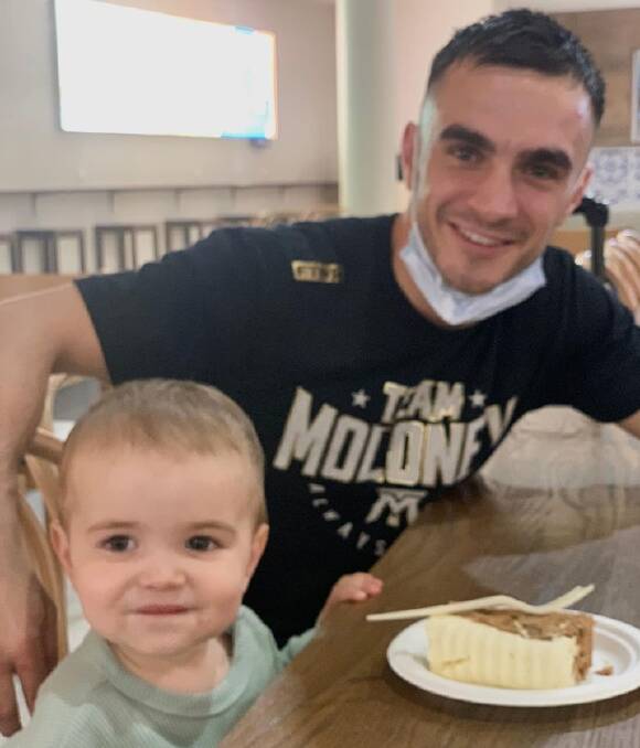 Andrew Moloney celebrated his son's birthday with carrot cake at the airport. Picture: Instagram