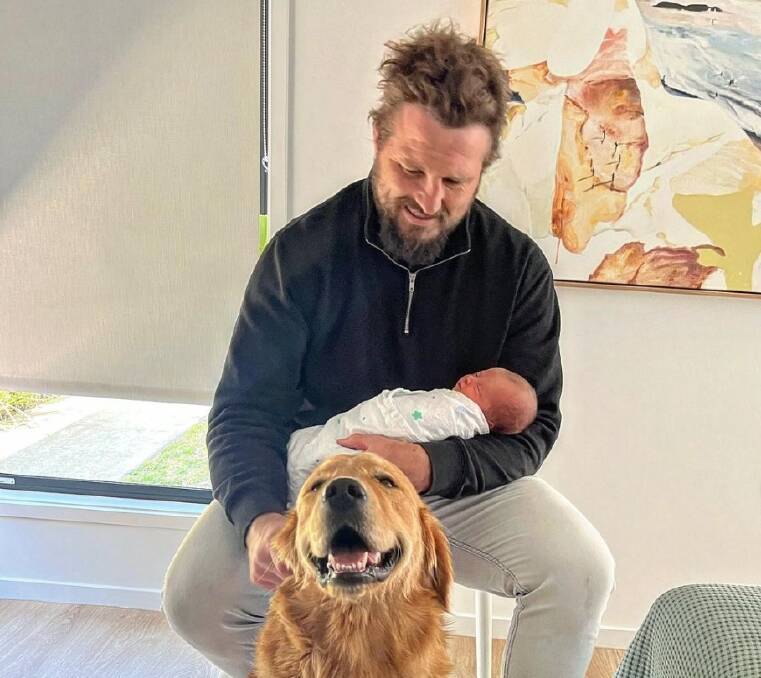 James Slipper with his baby girl Lily and golden retriever Roger. Picture Instagram