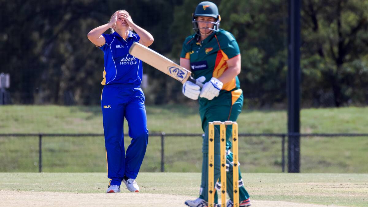Meteors' Chloe Rafferty reacts after a delivery came close to clipping the off stump of Tigers batter Rachel Priest. Picture: Sitthixay Ditthavong