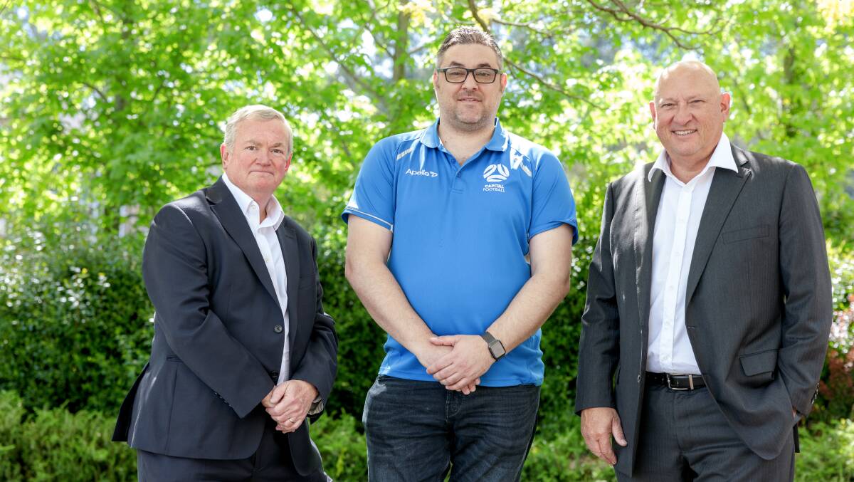 Capital Football chair Angelo Konstantinou, centre, is hopeful of having a new chief executive by Christmas. He's pictured with the previous two bosses - Chris Gardiner, left, and Ivan Slavich. Picture by Sitthixay Ditthavong