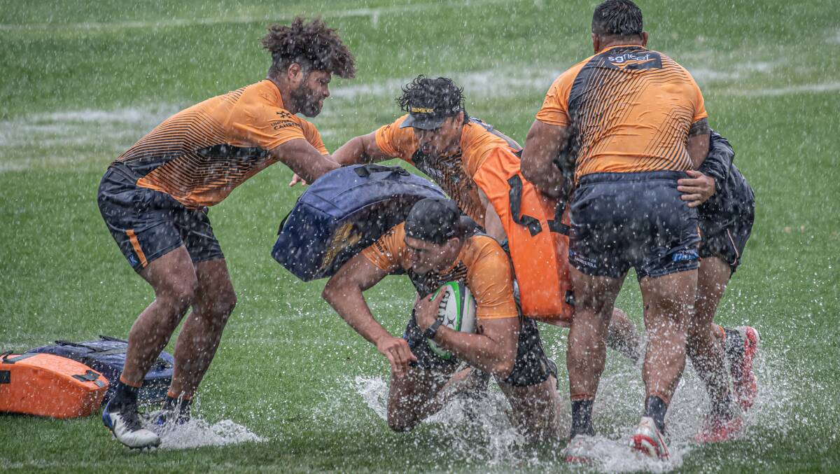 Darcy Swain and the Brumbies traded searing heat for heavy rain on Tuesday. Picture: Karleen Minney