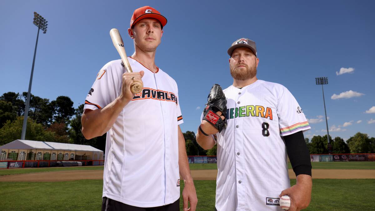 Robbie Perkins and Frank Gailey in the Cavalry's commemorative jerseys. Picture by James Croucher