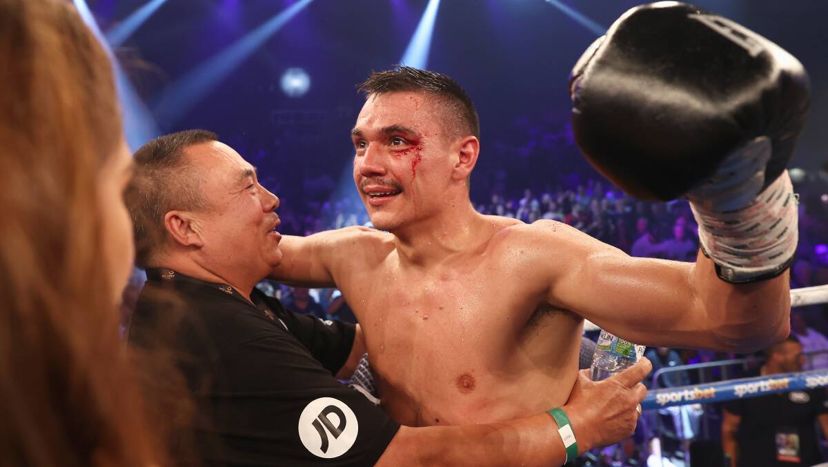 Tim Tszyu destroyed Dennis Hogan with a brutal body shot clinic. Picture: Getty