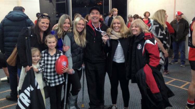 The Rourke family after a past grand final triumph.