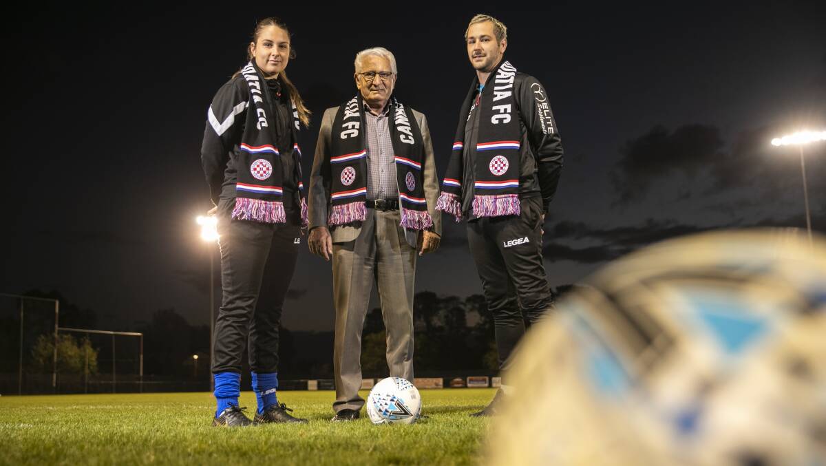 Stanko Milin with current players Cecilija Matic and Mathew Grbesa celebrate the name change back to the histortic name. Picture: Keegan Carroll