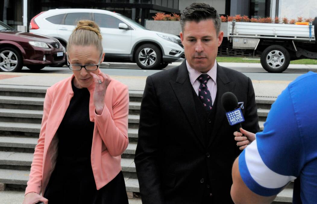 Bridie Harders and Ben Aulich leave the ACT Magistrates Court on Wednesday. Picture: Blake Foden