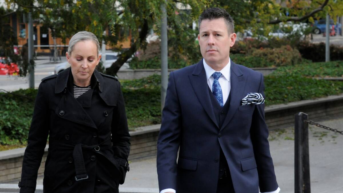 Ben Aulich, right, arrives at court with partner Erin Taylor on Monday. Picture: Blake Foden