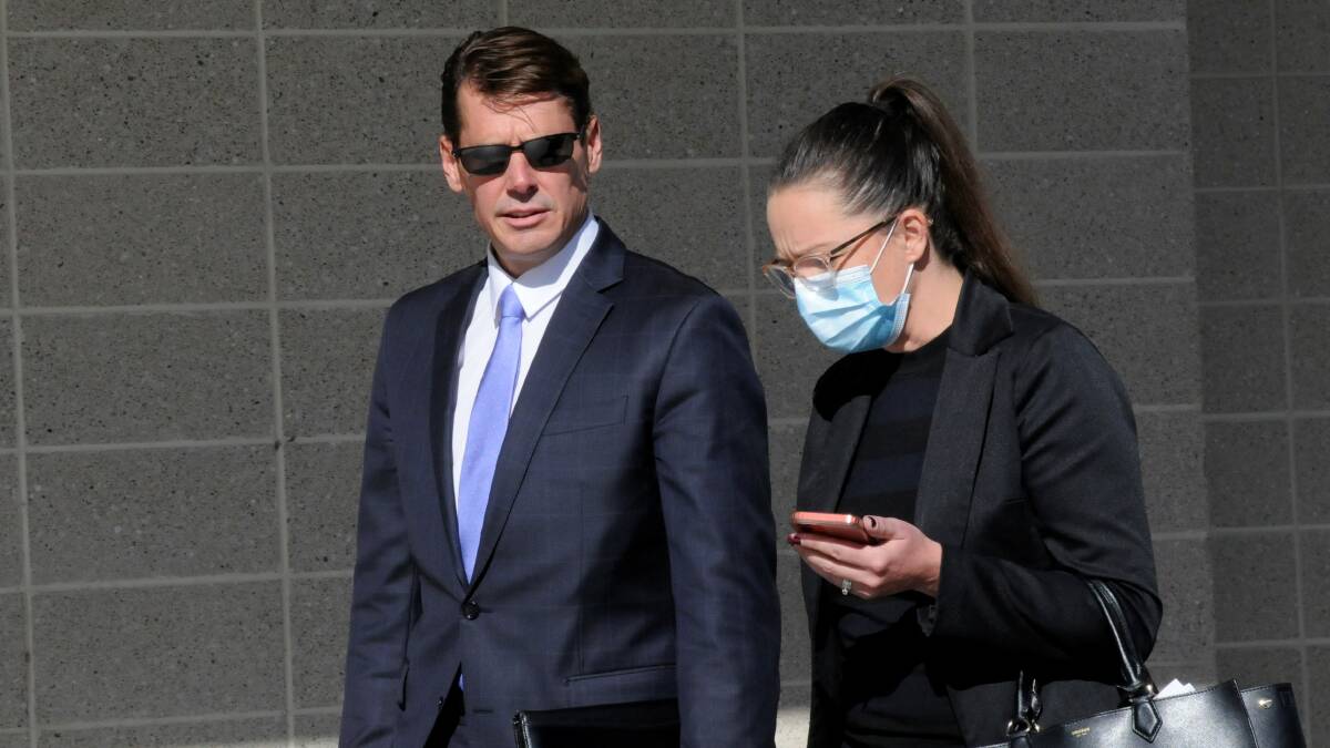 Aaron Alexander, left, leaves court on Thursday afternoon. Picture: Blake Foden