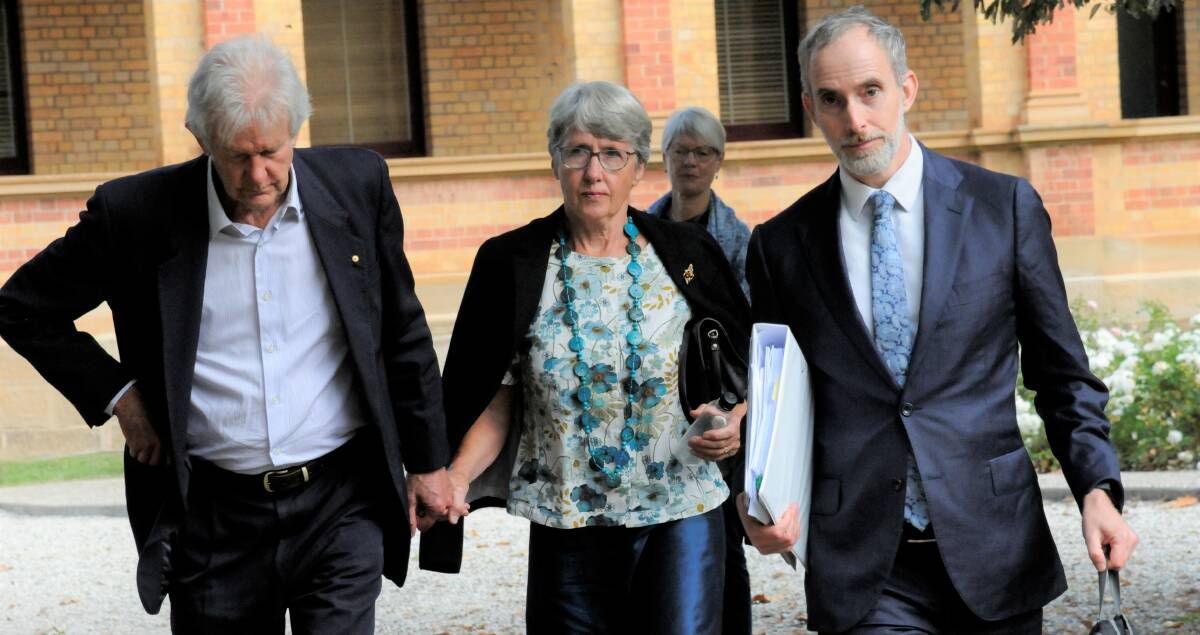 Barbara Eckersley, centre, leaves court with her her husband Richard Eckersley, left, and barrister Kieran Ginges, right. Picture: Blake Foden