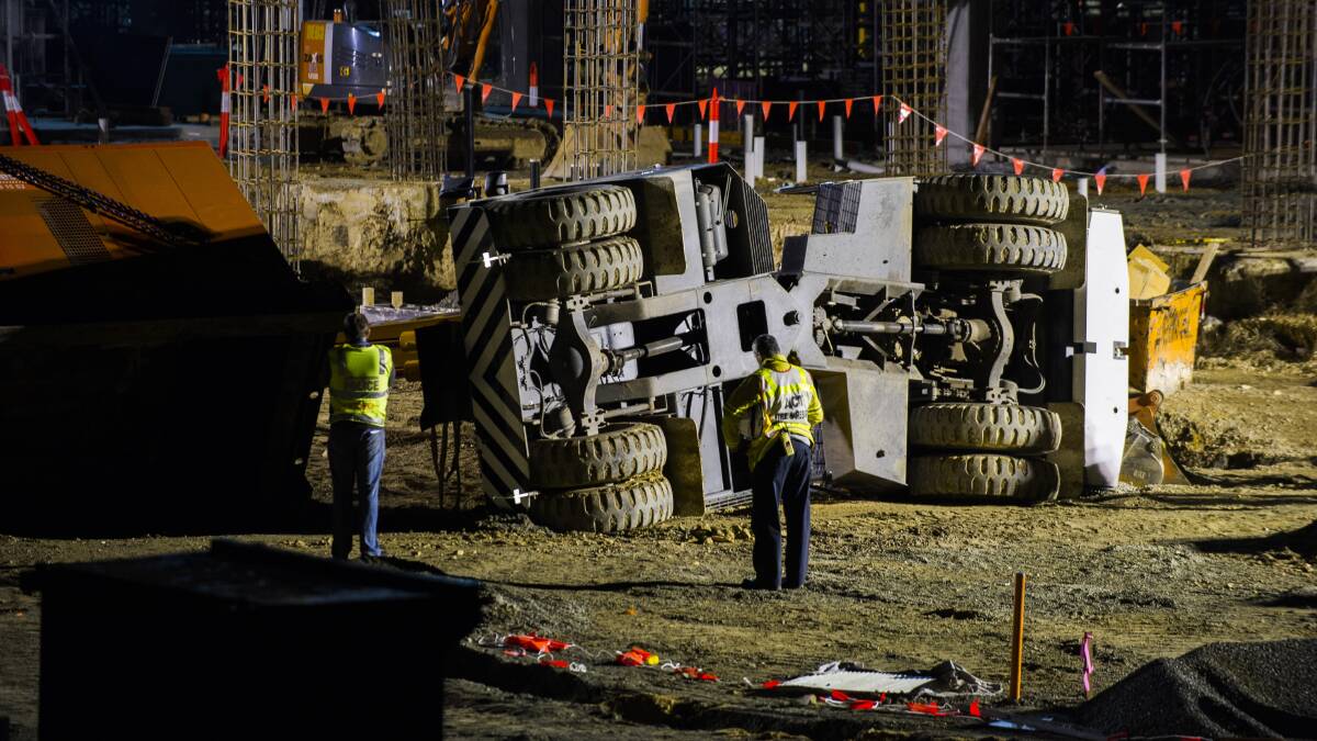 The fallen mobile crane lies on its side after the death of Herman Holtz on August 4, 2016. Picture: Rohan Thomson