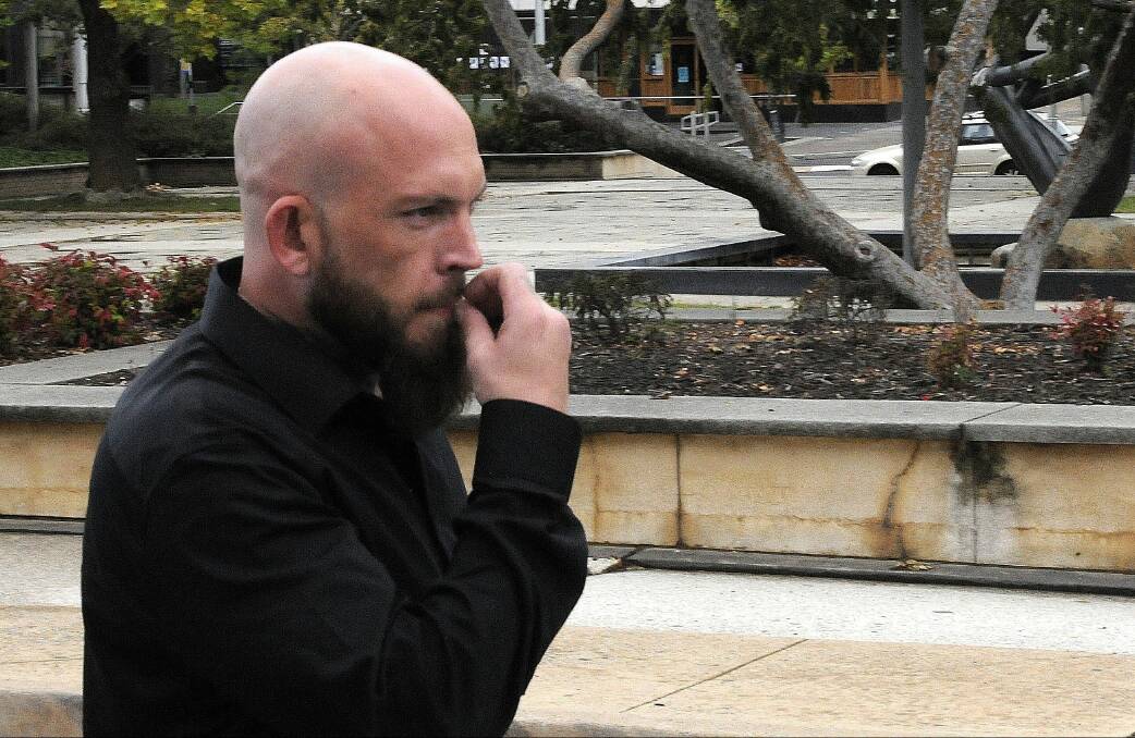 Christopher Cunningham leaves the ACT Supreme Court on Monday after being granted bail. Picture: Blake Foden