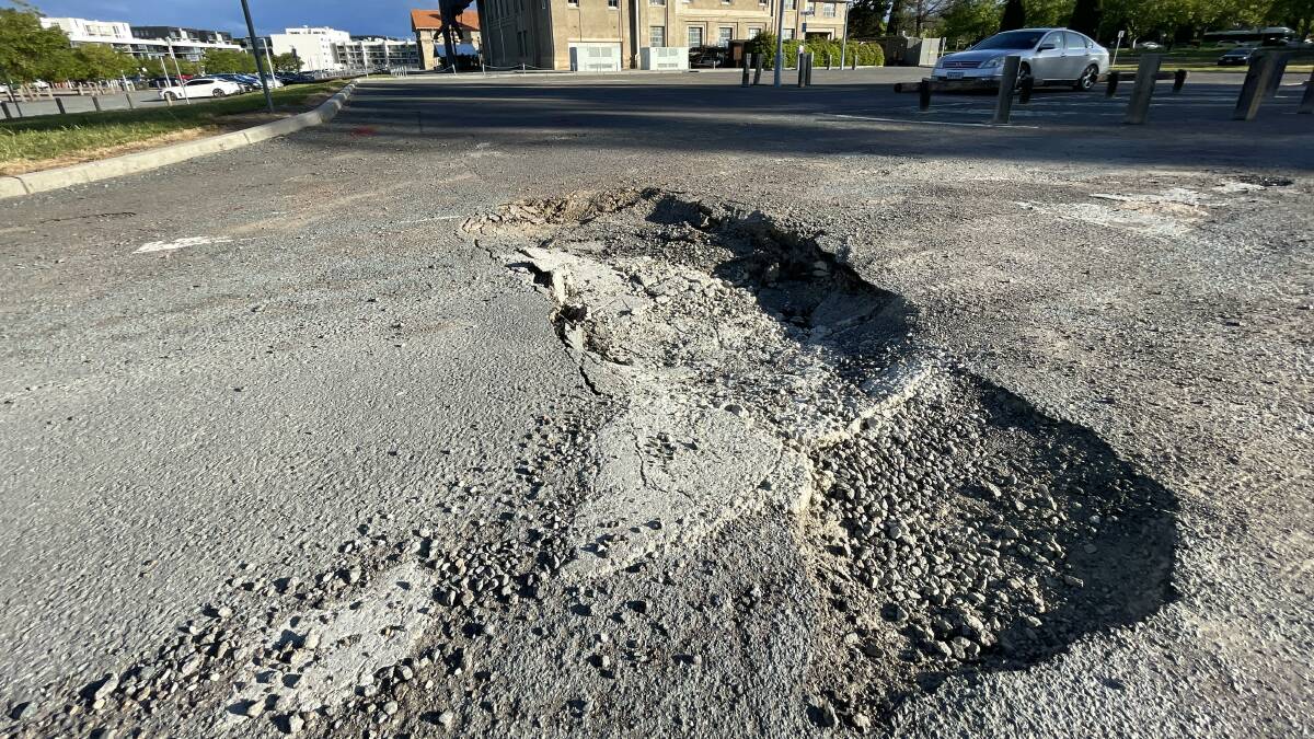 A large pothole in Kingston. Picture by Sitthixay Ditthavong