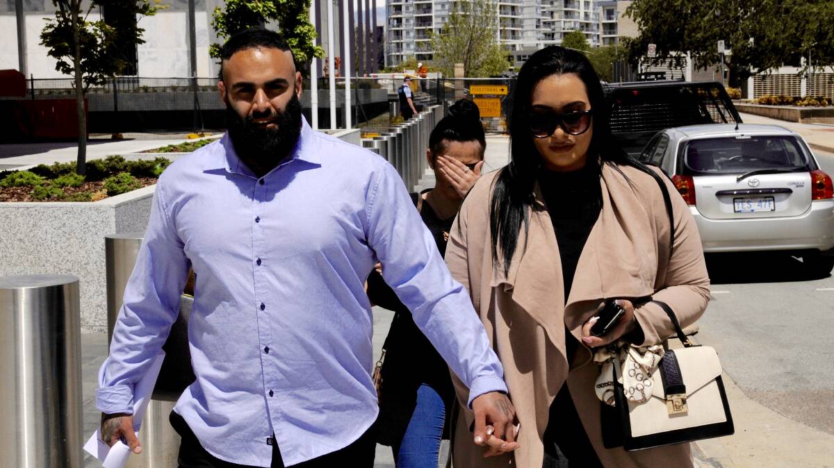 Benjamin James Moarefi leaves the ACT Supreme Court, hand in hand with fiancee Anna Roufogalis, after being granted bail. Picture: Blake Foden