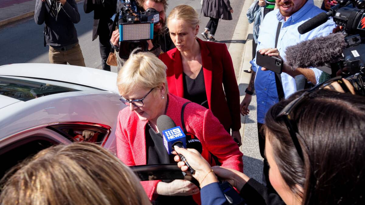 Linda Reynolds is mobbed by media after giving evidence in Bruce Lehrmann's trial. Picture by Sitthixay Ditthavong