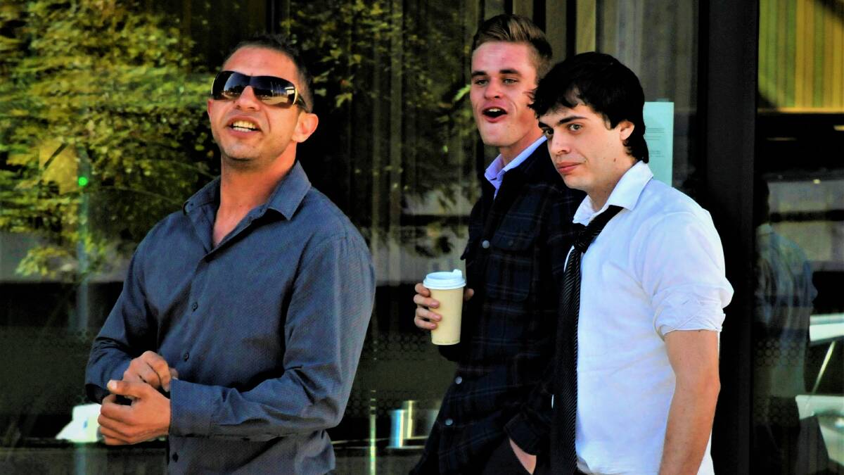 Brawler Jaxson Kirkwood, right, outside court with vocal supporters earlier this year. Picture: Blake Foden