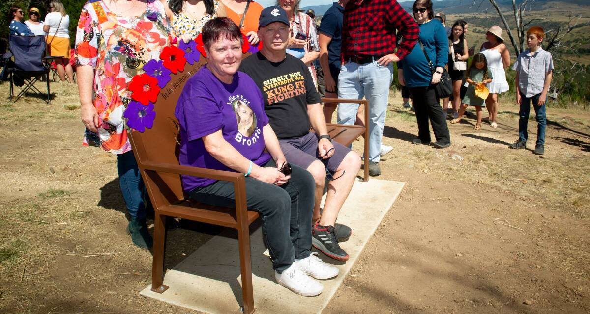 Bronte Haskins' mother, Janine Haskins, and stepfather, Peter McLaren, on the bench unveiled in her honour. Picture by Elesa Kurtz