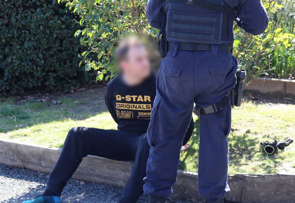 A man is arrested in Queanbeyan on Thursday morning. Picture: NSW Police