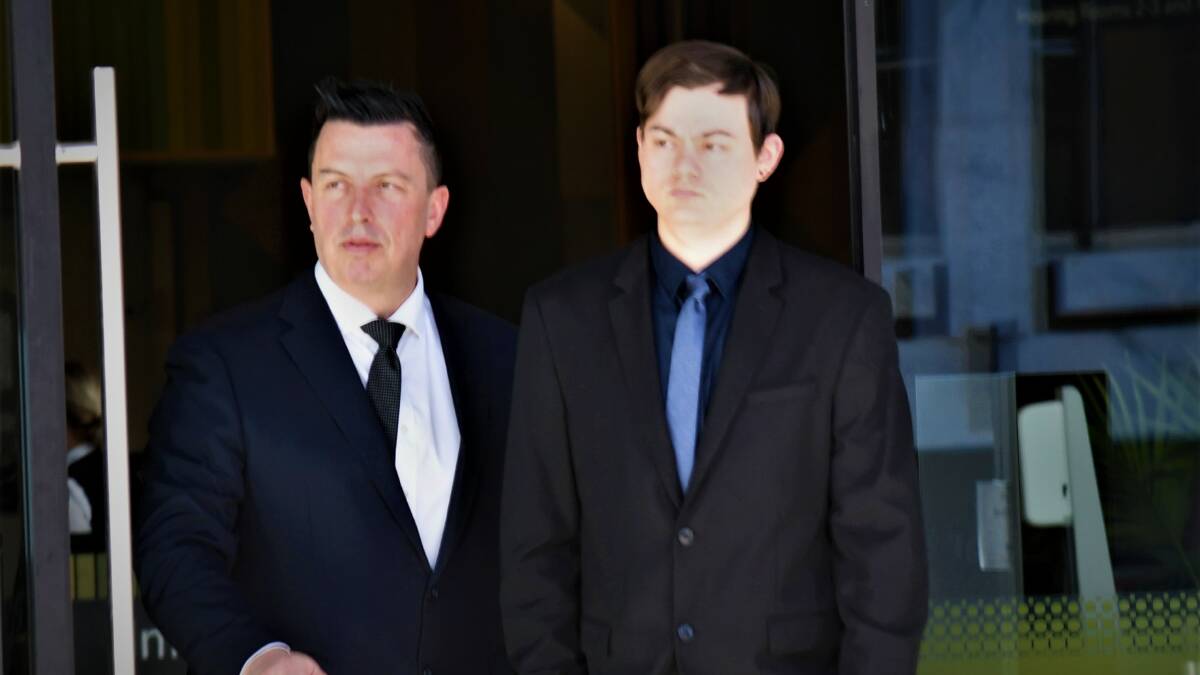 Thomas Small, right, leaves court with solicitor David Healey on Monday. Picture by Blake Foden