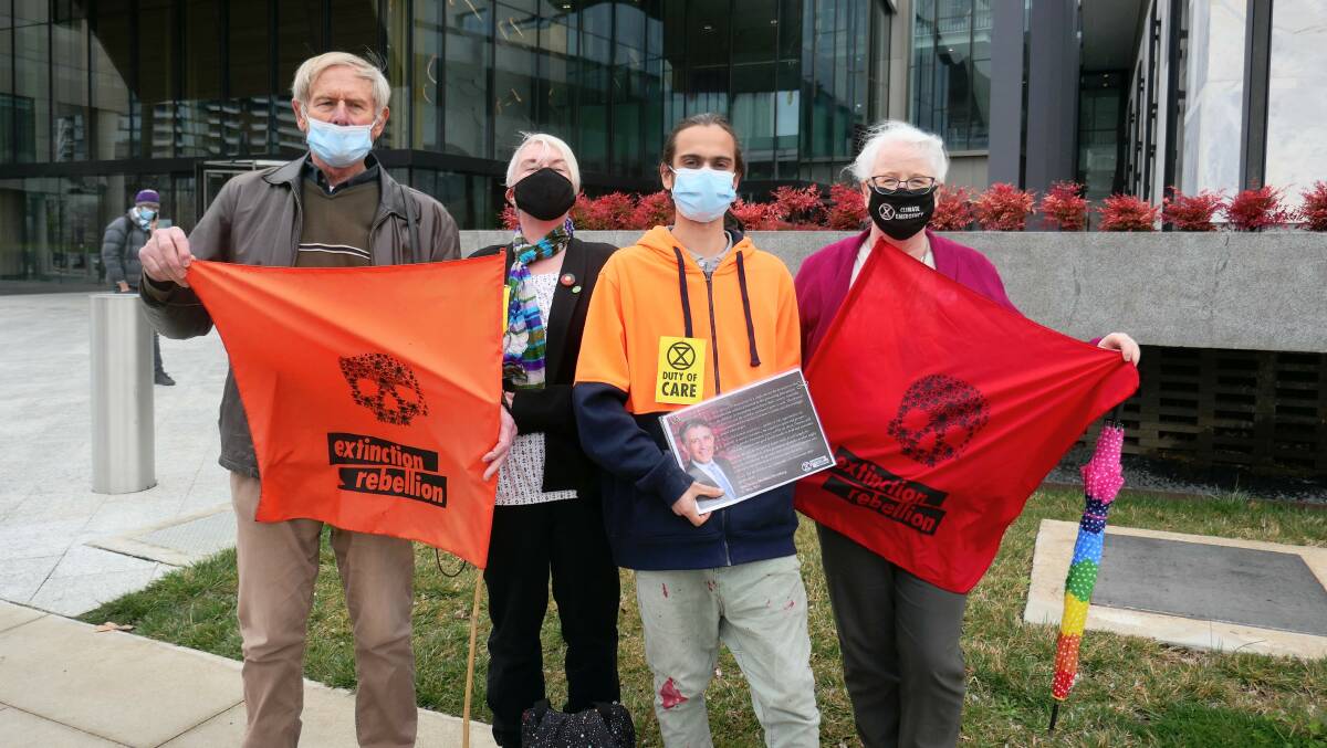 Lesley Mosbey, far right, outside court last year with fellow climate change activists Nicholas Abel, Sarah Edwards and Eric Herbert. Picture: Toby Vue