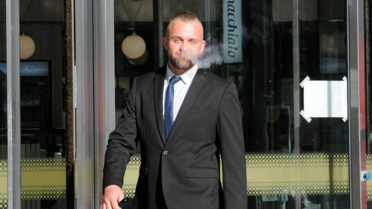 Ryan Marshall leaves court behind a puff of smoke on Wednesday. Picture: Blake Foden