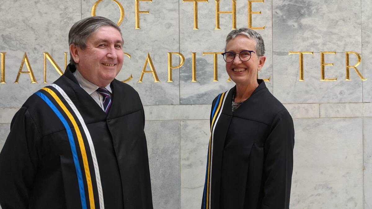 The recently retired John Burns and soon-to-be-retired Chief Justice Helen Murrell outside the ACT Supreme Court. Picture: Supplied
