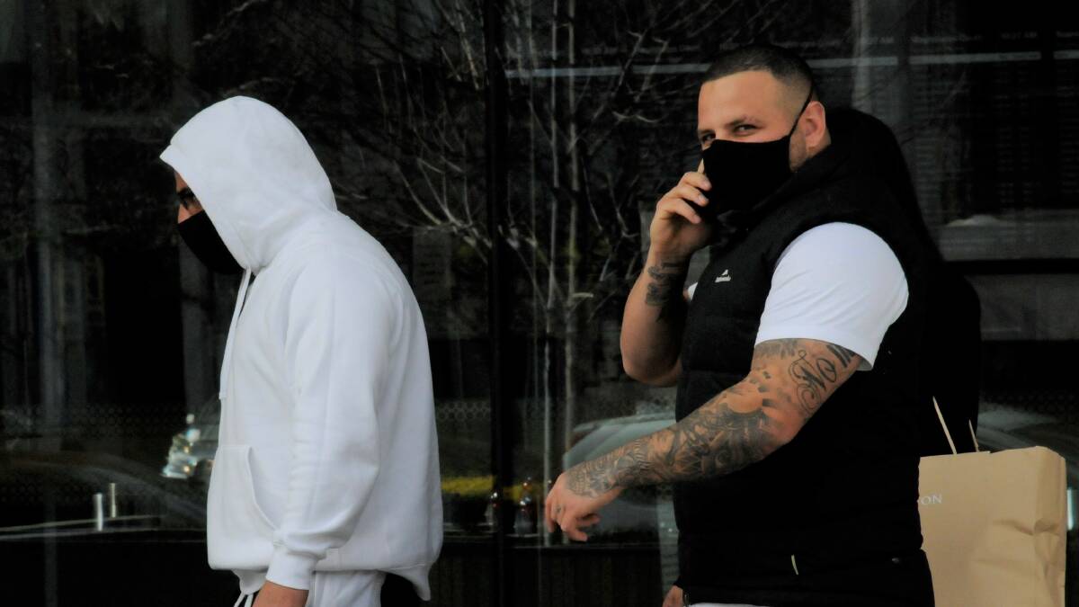 Jomal Nchouki, right, outside court with his former bikie boss brother, Mohammed, last year. Picture: Blake Foden