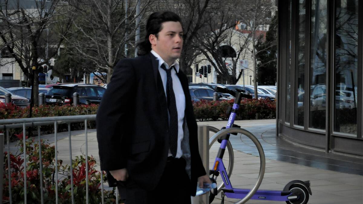 Joshua Nabytowicz-Cannizzaro takes some of his final steps of freedom outside court on Thursday. Picture: Blake Foden