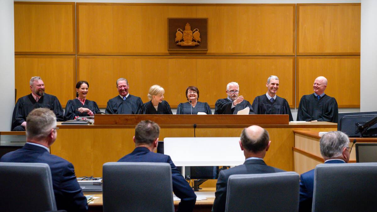 Magistrate Peter Morrison, third from right, leaves his colleagues in stitches during his retirement speech. Picture: Elesa Kurtz