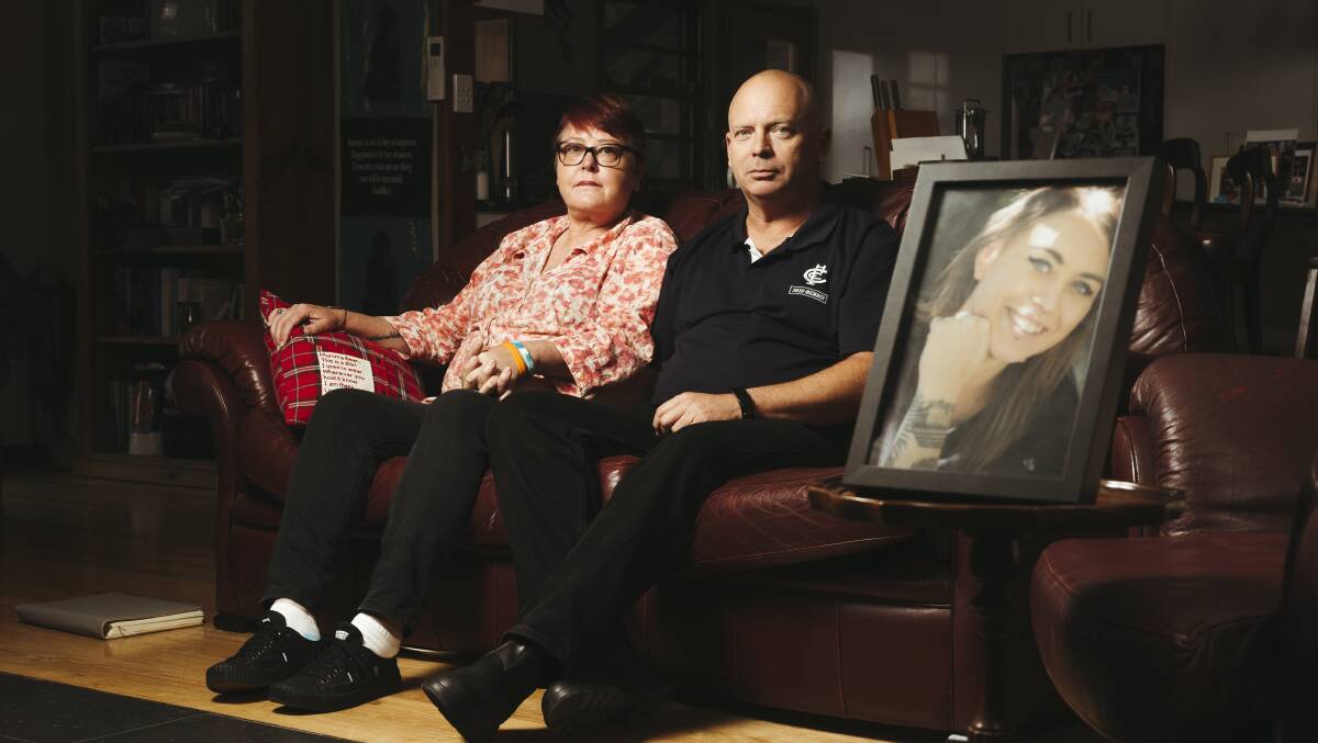 Janine Haskins with husband Peter McLaren and a picture of her daughter, Brontë Haskins. Picture by Dion Georgopoulos