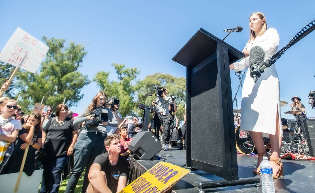 Brittany Higgins addresses a large crowd in Canberra at the March 4 Justice protest. Picture: Karleen Minney