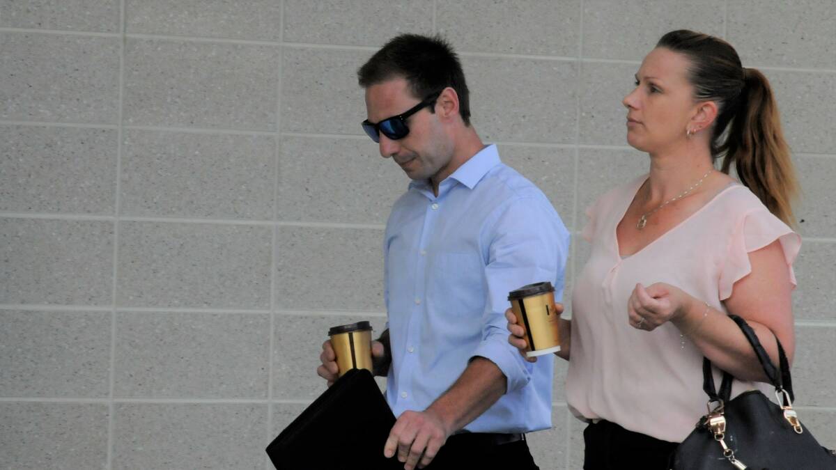 Mitchell Laidlaw, left, outside court with his partner on a previous occasion. Picture: Blake Foden
