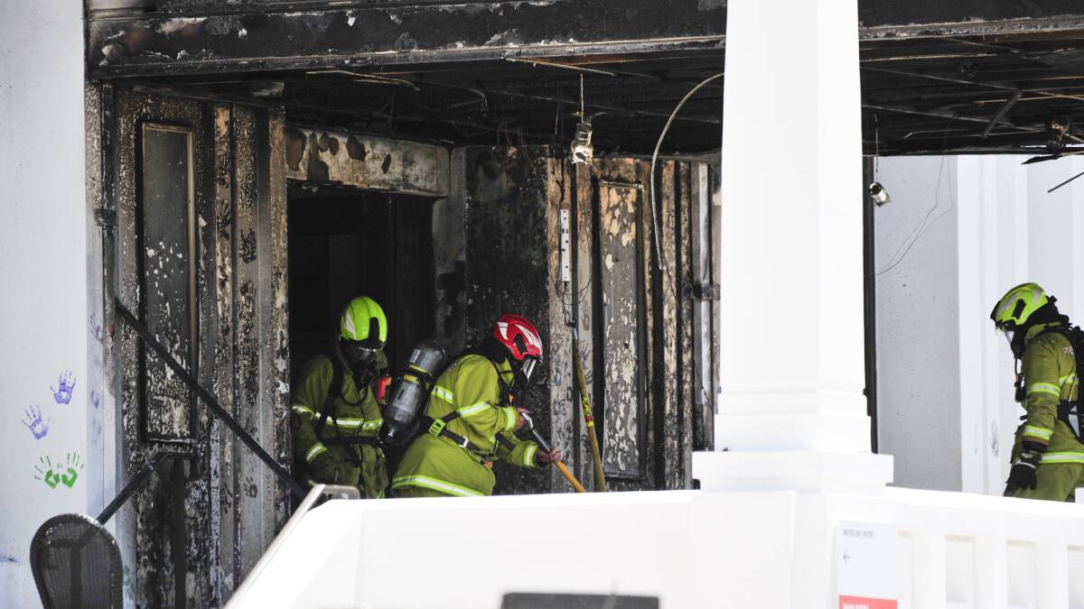 Firefighters at Old Parliament House after the December 2021 blaze. Picture: Dion Georgopoulos