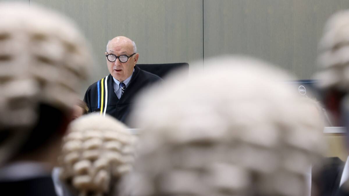 Local barristers watch on as Justice Michael Elkaim gives his retirement speech. Picture by James Croucher