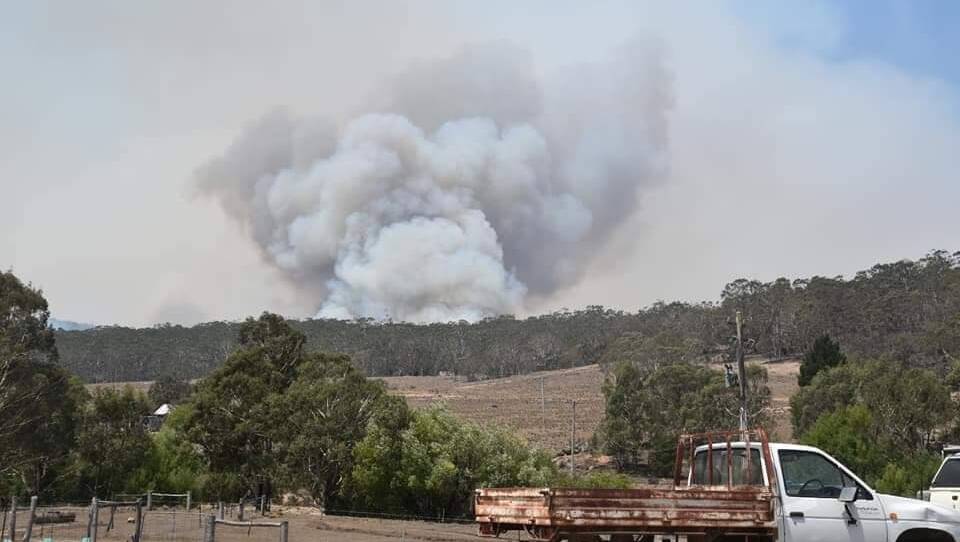 OUT OF CONTROL: A smoke plume over Creewah on Sunday. Picture: Supplied.