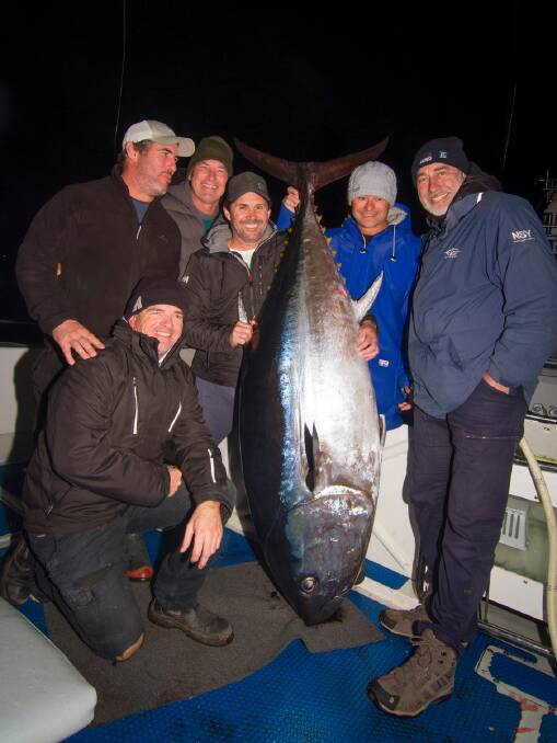 Customers of Charter Fish Narooma all smiles after landing a 148kg bluefin tuna on June 29. Image: Georgia Poyner.