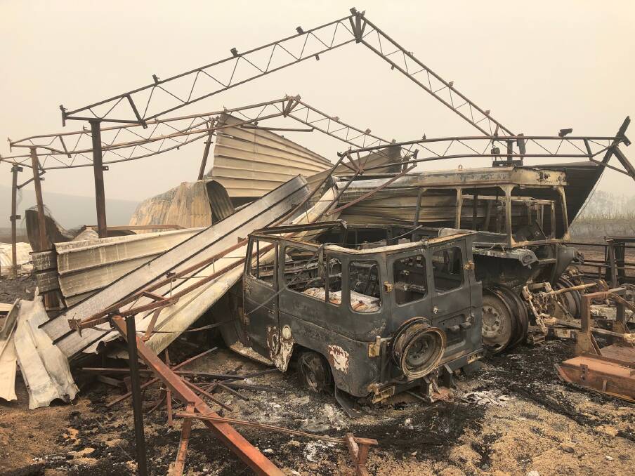 Vehicles were left shells and the shed housing them collapsed as fire tore through Maragle, north of Tooma, on New Year's Eve. Picture: Vanessa Keenan