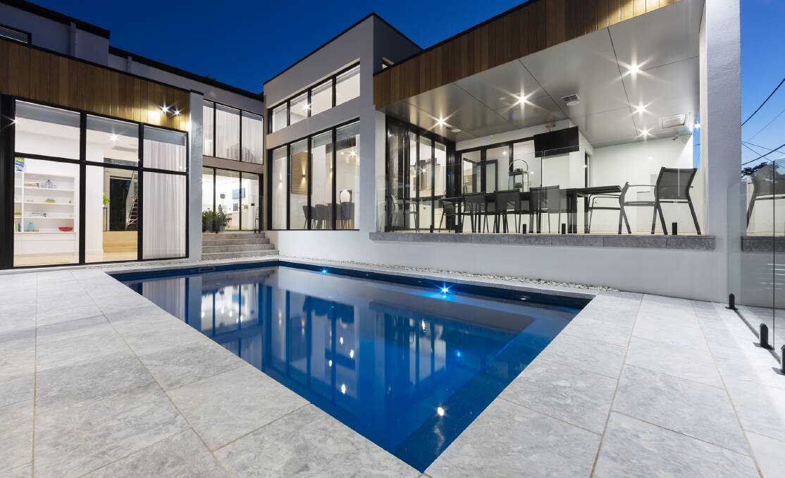 This swimming pool forms the centrepiece of the backyard. Picture: Supplied