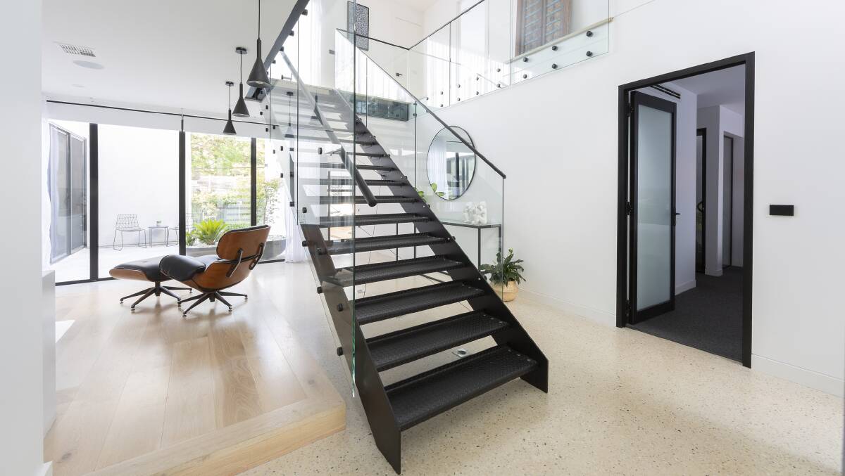 Going up: the black steel staircase feature. Picture: Supplied