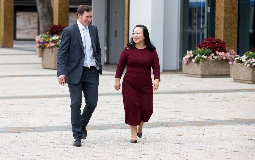 Former opposition leader Alistair Coe and his successor Elizabeth Lee walk out of the ACT Legislative Assembly to speak to media on Friday. Picture: Sitthixay Ditthavong