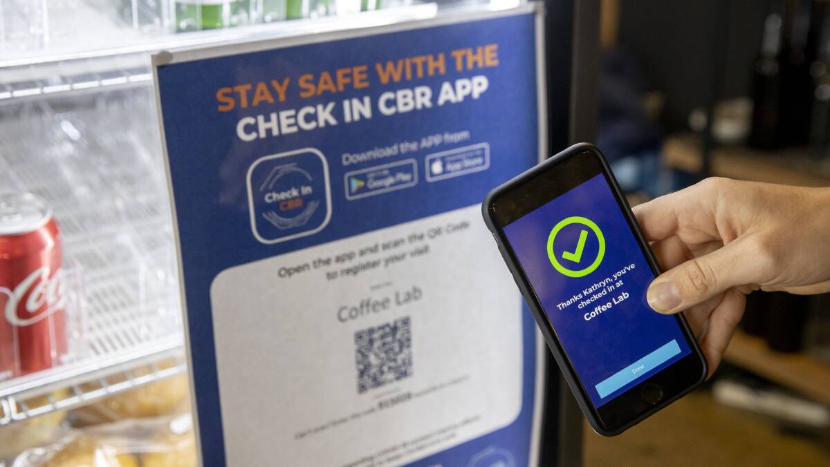 The Check In CBR app is used for contact tracing purposes but some businesses have raised concerns. Picture: Sitthixay Ditthavong