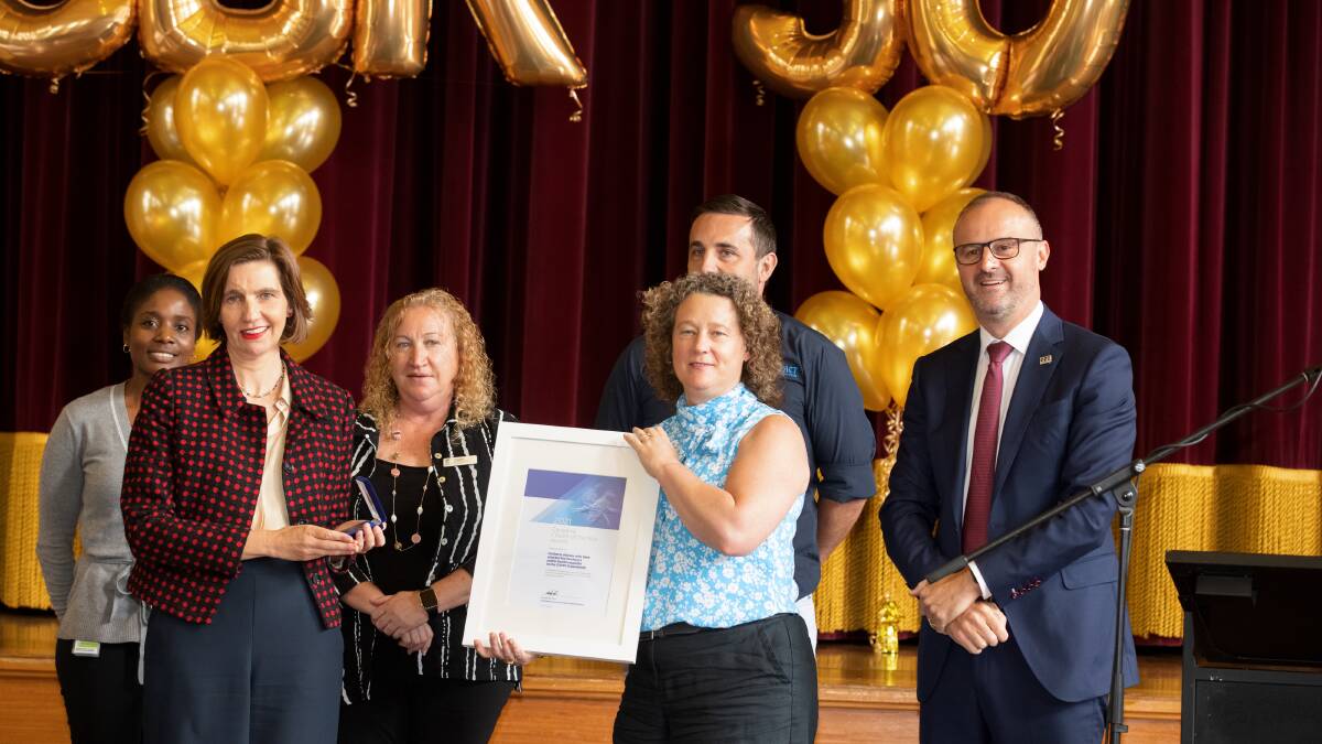 ACT Chief Minister Andrew Barr, right, awarded every Canberran who took part in the territory's public health response to the coronavirus pandemic as 2021 Canberra Citizens of the Year. Picture: Sitthixay Ditthavong